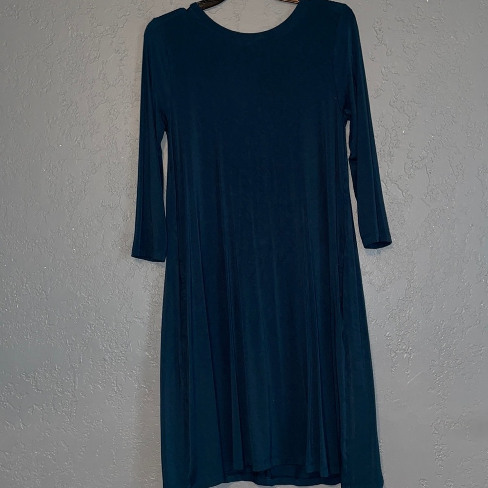 Small long sleeve tunic dress with pockets.